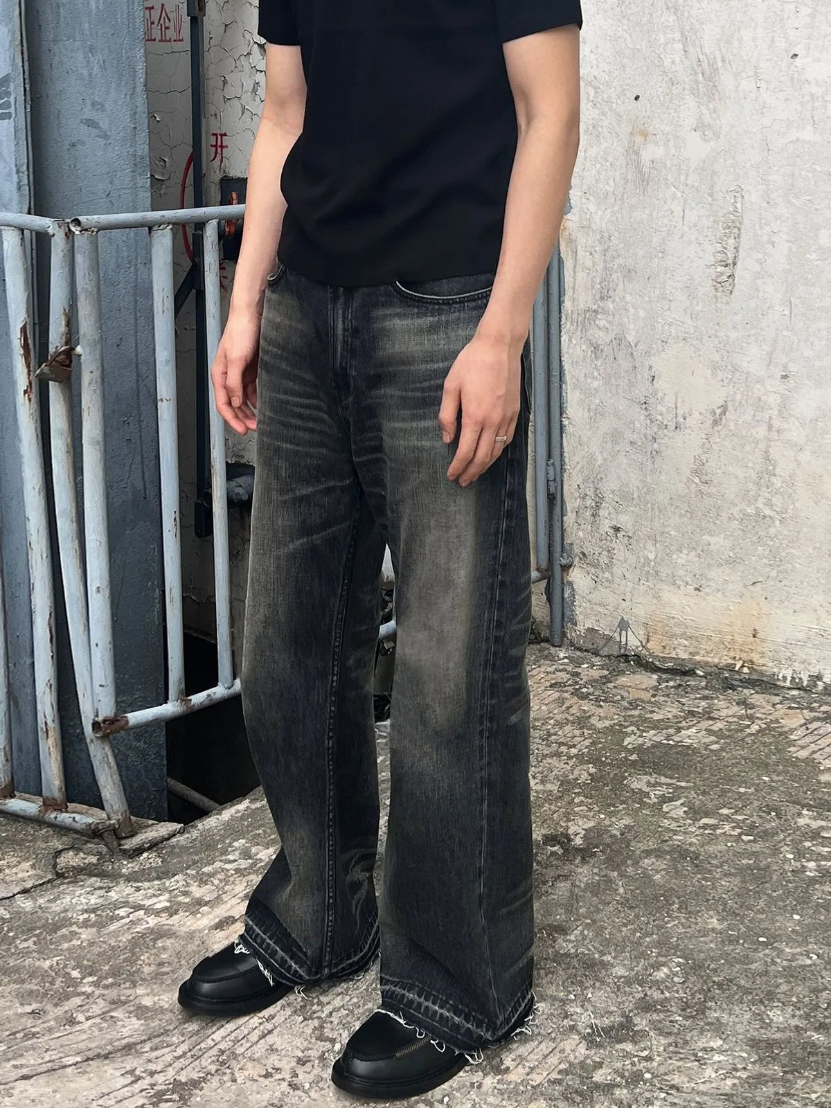 Men's vintage washed denim jeans with frayed hem by Plush Fashion Hub, showcasing distressed denim style and classic fit.
