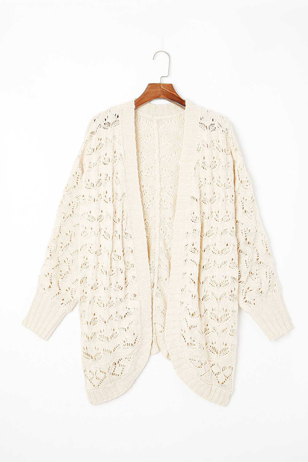 A beige open-front knit cardigan with ribbed trim hangs on a wooden hanger against a white background.