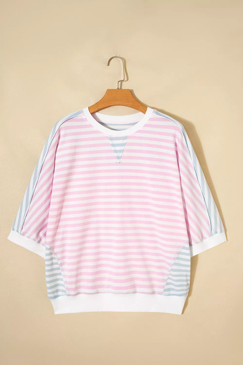 Casual oversized striped Dolman sleeve patchwork T-shirt by Plush Fashion Hub, featuring relaxed fit and colorful patchwork design.