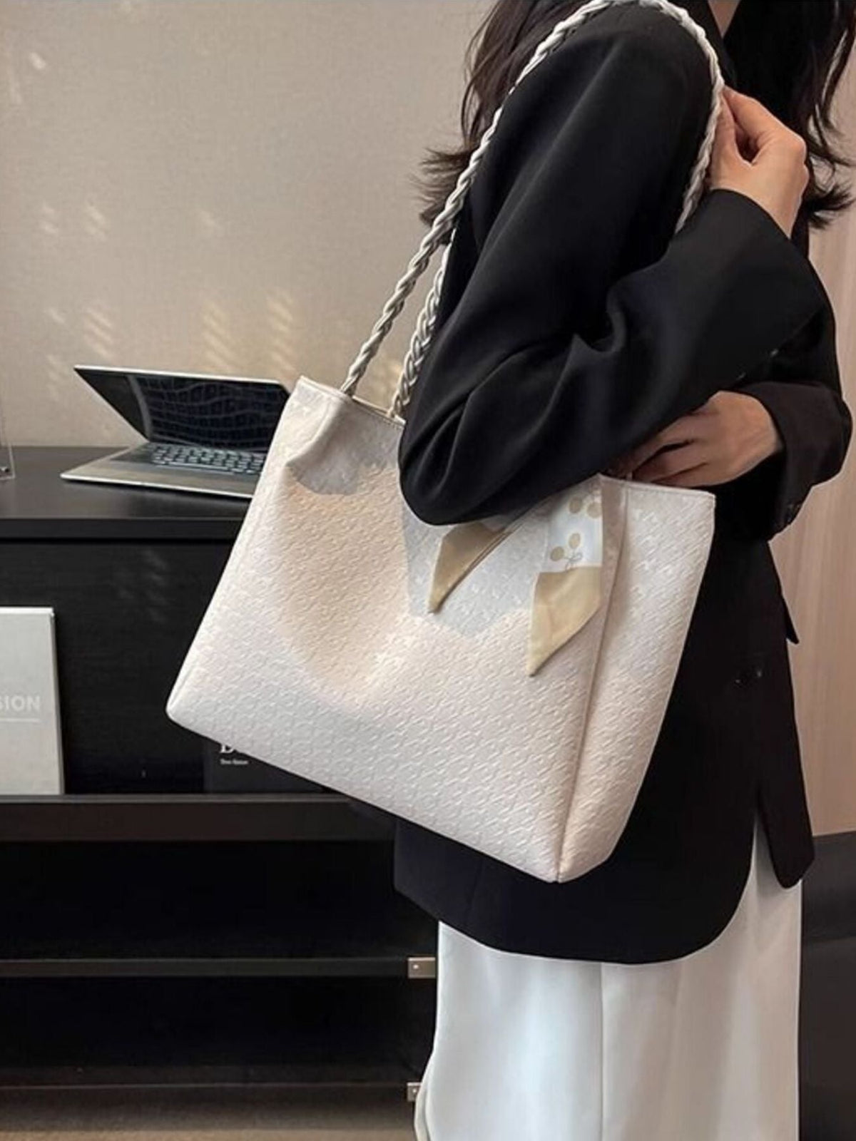Plush Fashion Hub braided handle tote bag with sturdy handles and spacious interior, perfect for everyday use.