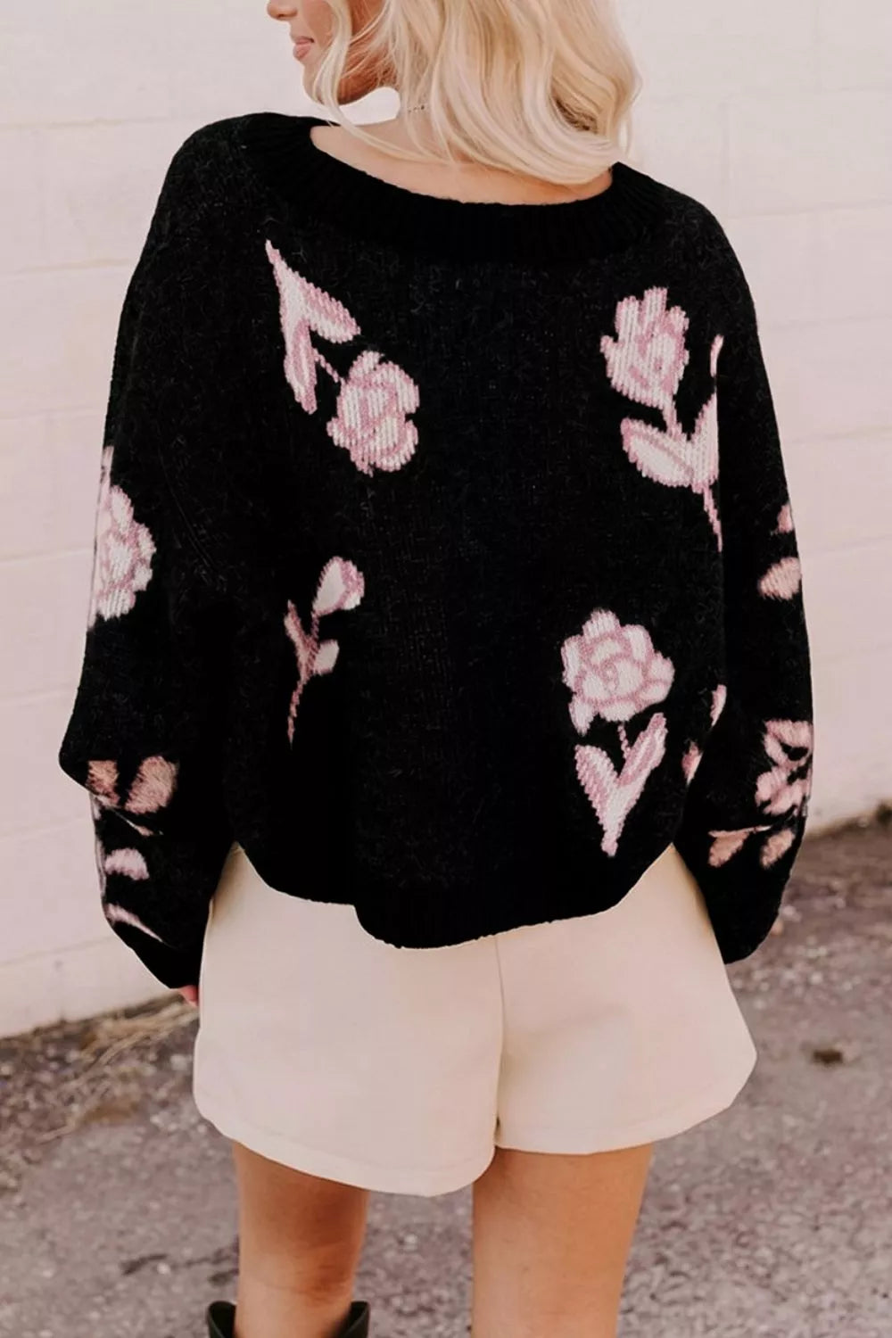 Floral pattern puff sleeve dropped shoulder pullover sweater by Trendsi, featuring a cozy knit with vibrant floral designs.