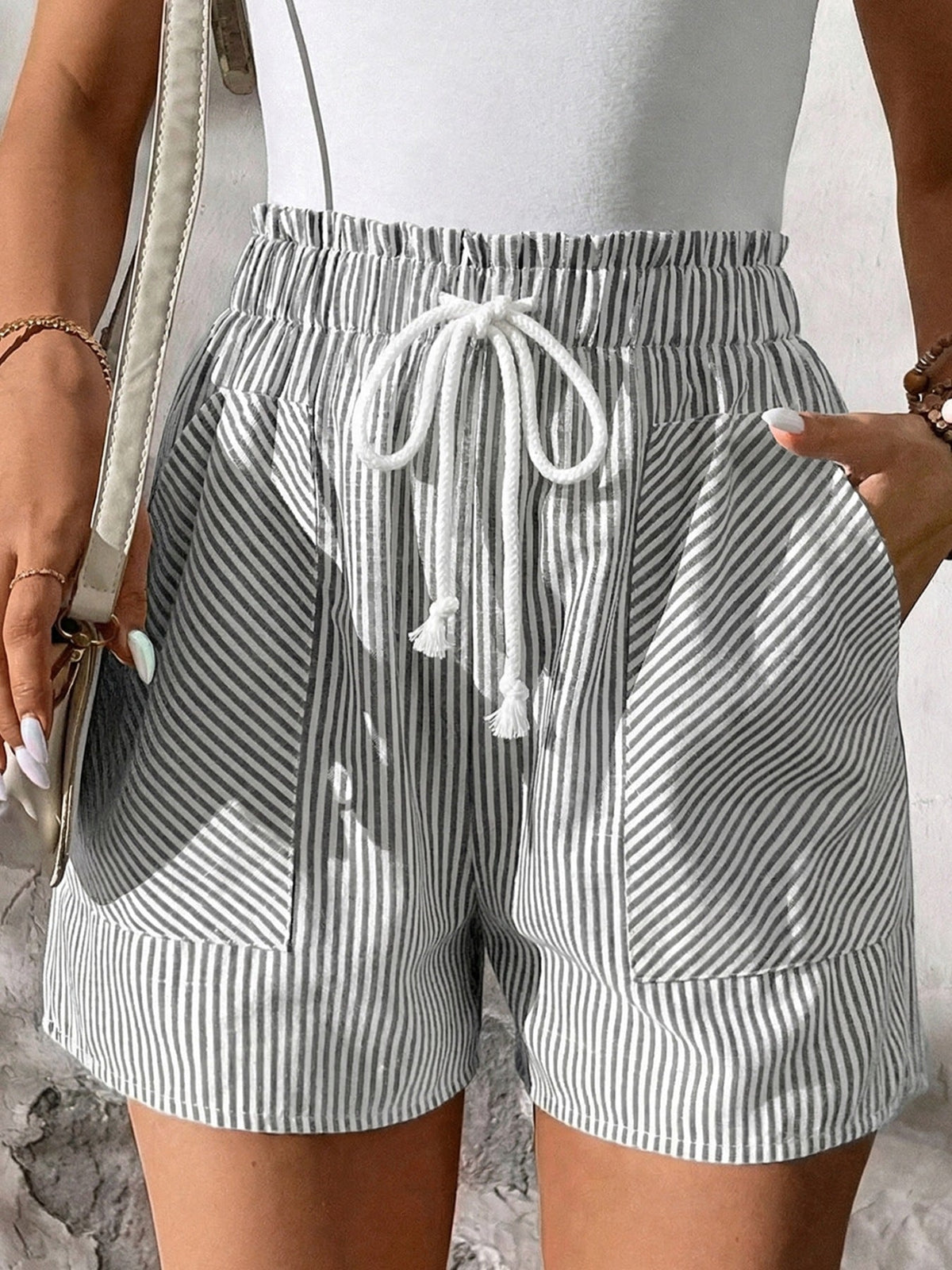 Striped elastic waist drawstring shorts from Plush Fashion Hub, featuring a casual fit and comfortable design.