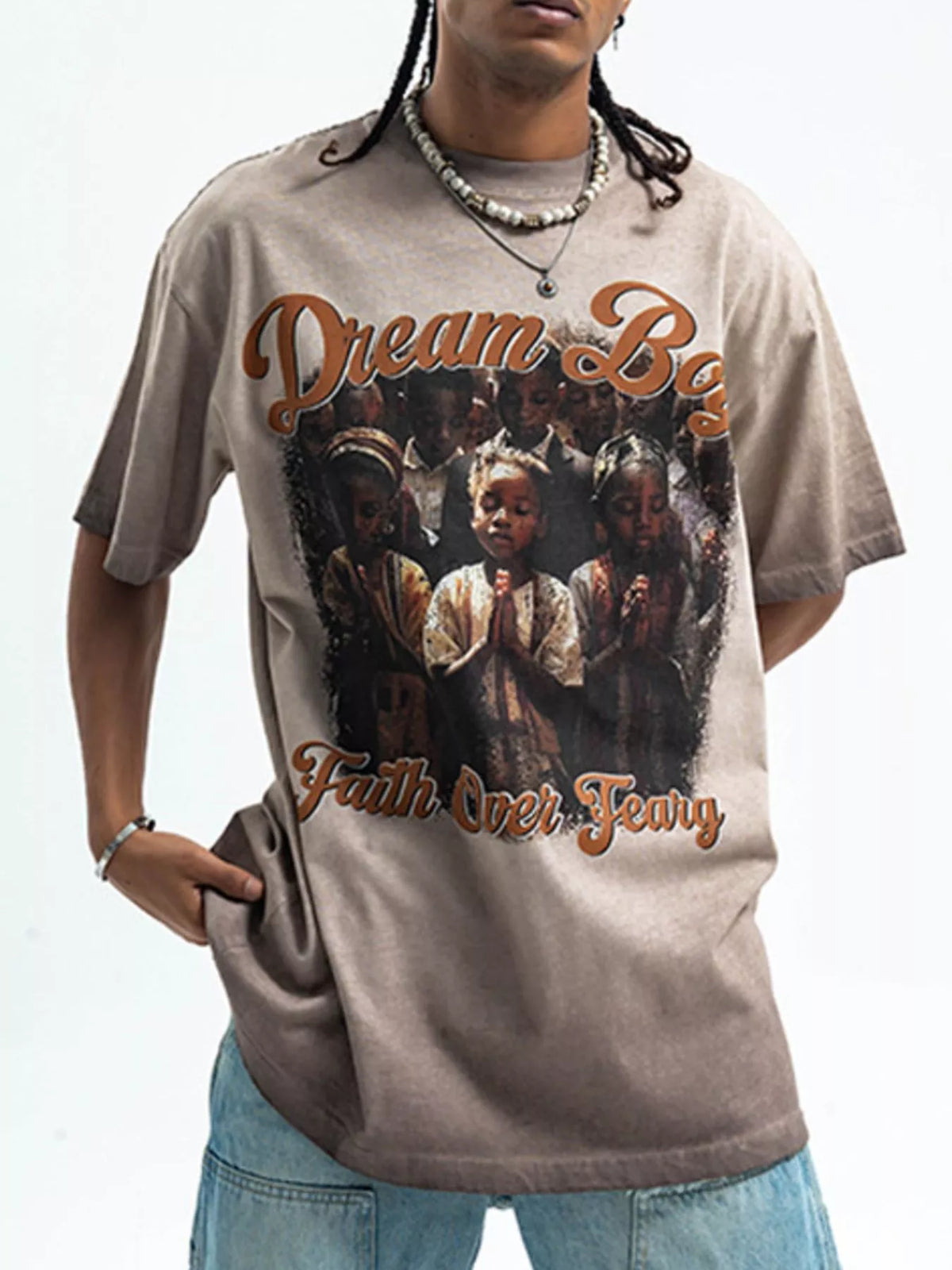 Men's graphic round neck short sleeve T-shirt from Trendsi, featuring a stylish design on soft fabric.