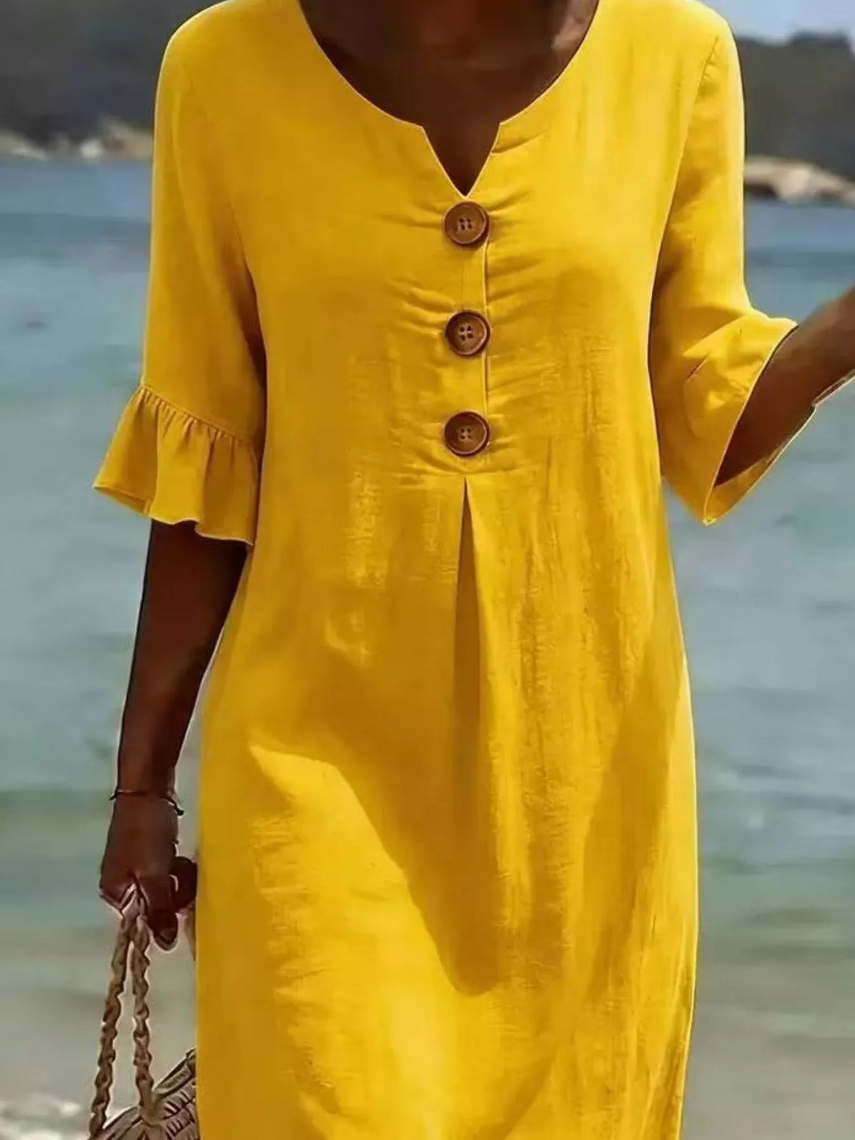 Plus size ruffle sleeve midi dress with button details from Plush Fashion Hub, featuring a stylish and flowy design.