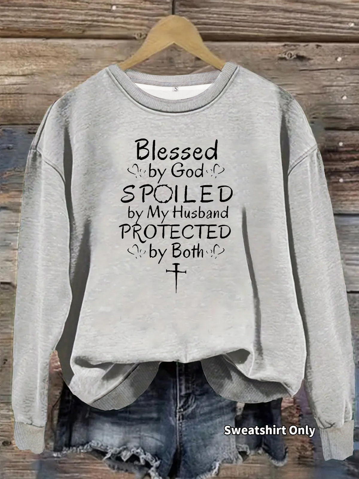 Heather grey long-sleeve cotton sweatshirt with black text reading "Blessed by God SPOILED by My Husband PROTECTED by Both".