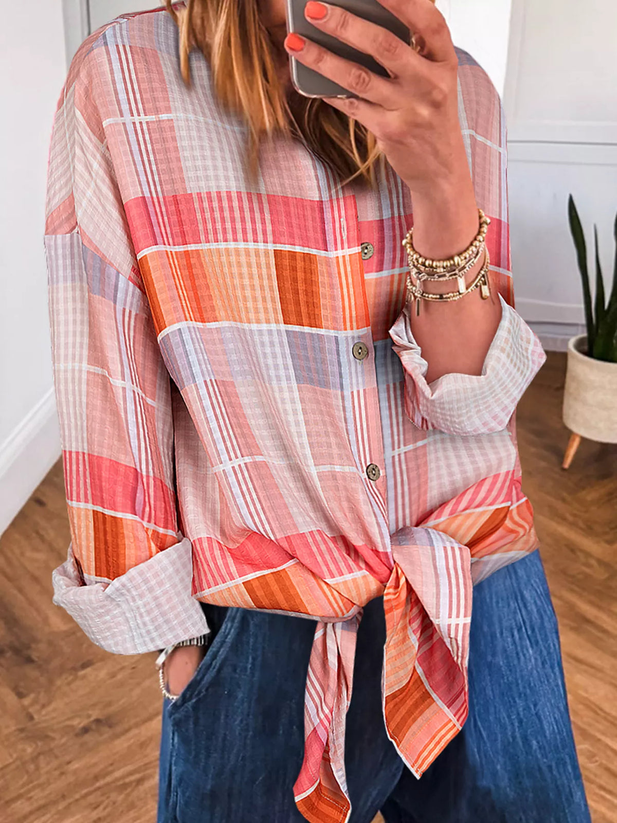Oversized check tunic shirt for women featuring a relaxed fit, button-up front, and classic plaid pattern, stylish and comfortable.