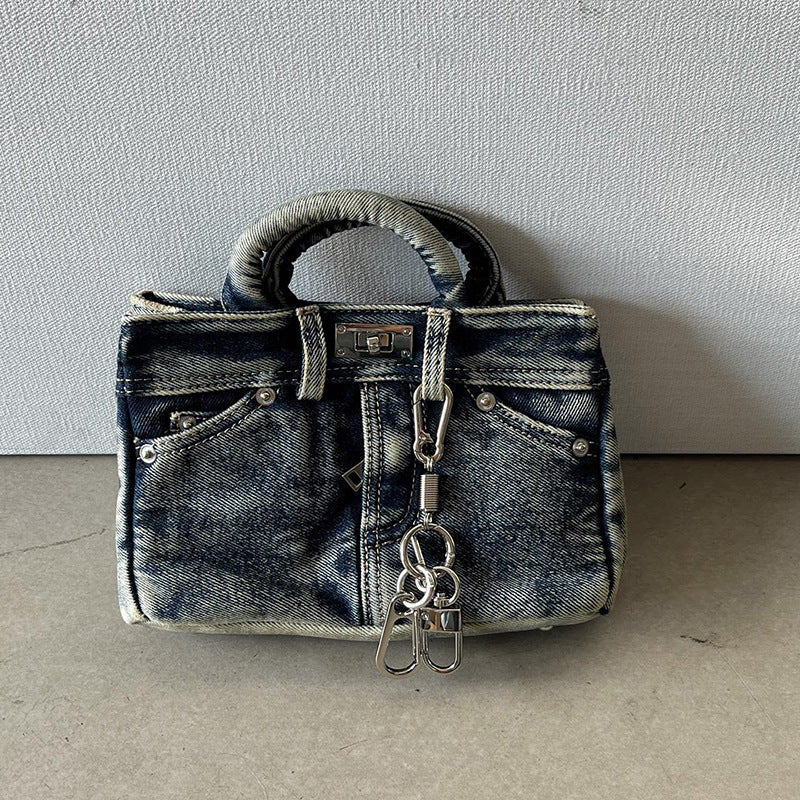 Vintage denim platinum handbag by Plush Fashion Hub, versatile shoulder and crossbody bag for women with stylish design.