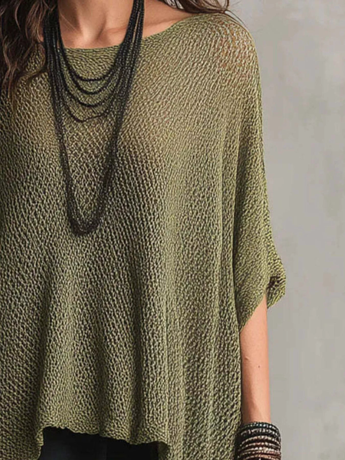 Plus size Plush Fashion Hub knit round neck top with loose fit, soft and cozy, perfect for casual wear.
