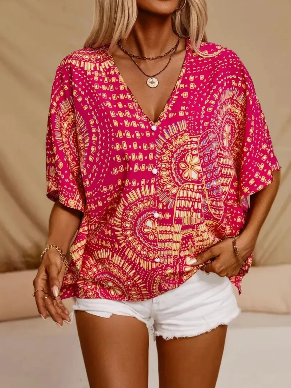 Women's printed V-neck half sleeve blouse by Plush Fashion Hub, casual soft stretch office top with colorful pattern.