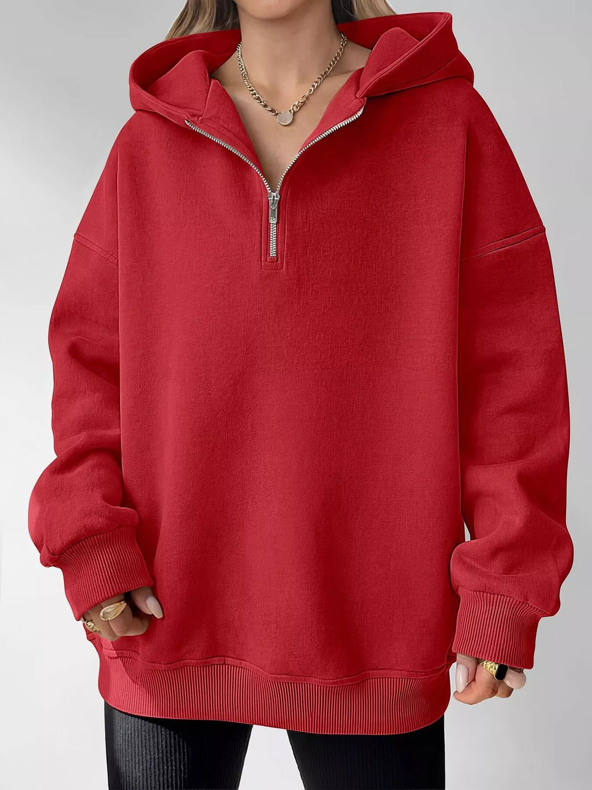 Oversized quarter-zip hoodie from Trendsi, casual tops in soft fabric with a relaxed fit and front quarter-zip closure.