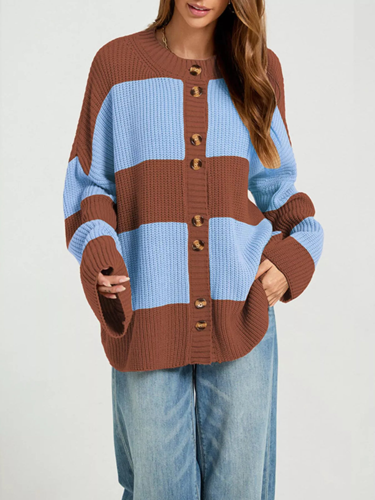 Color block striped button-up cardigan from Trendsi, featuring vibrant multicolor design and classic button closure.