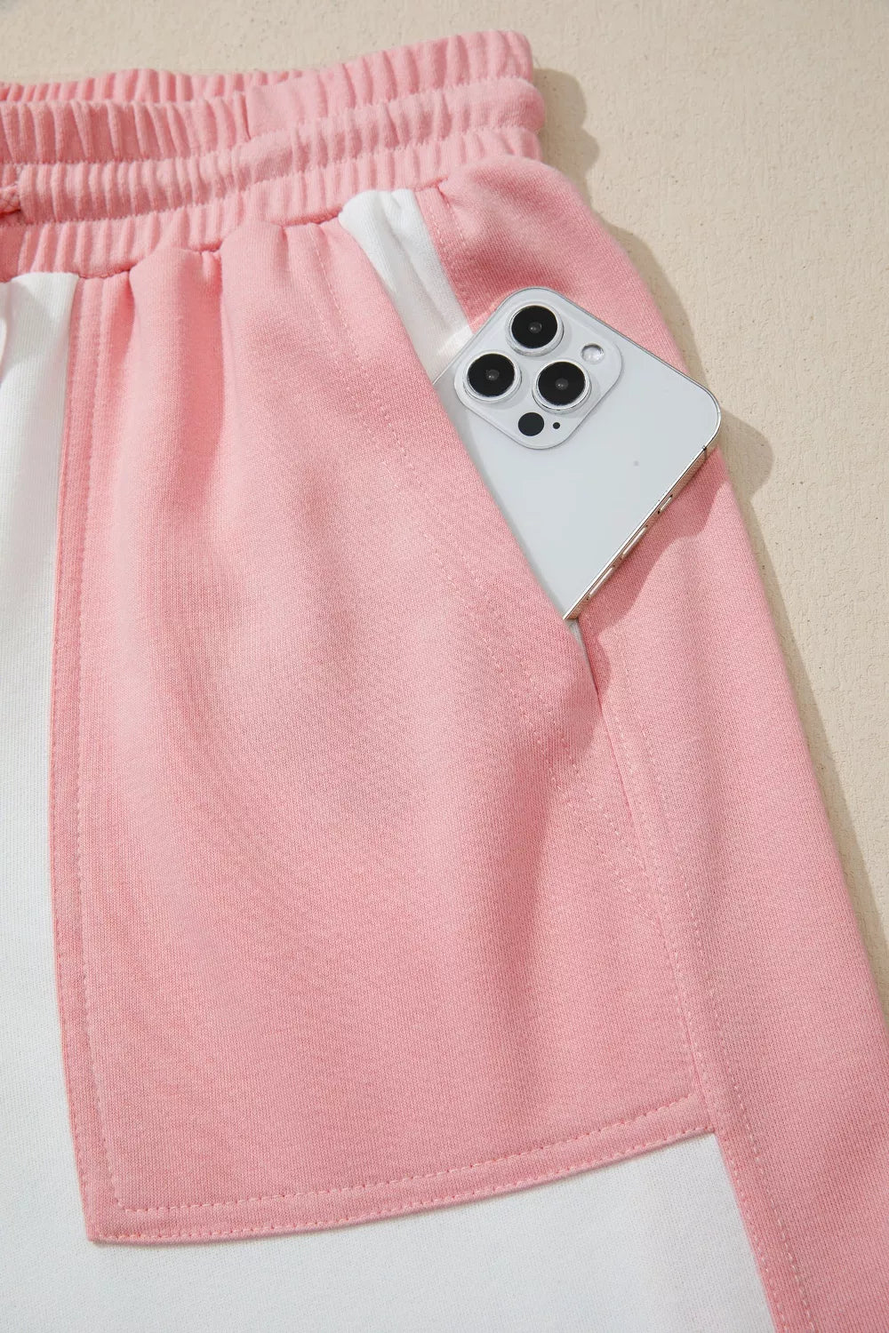 Two-tone color block patchwork loungewear set with a loose fit tee and drawstring pants by Plush Fashion Hub.