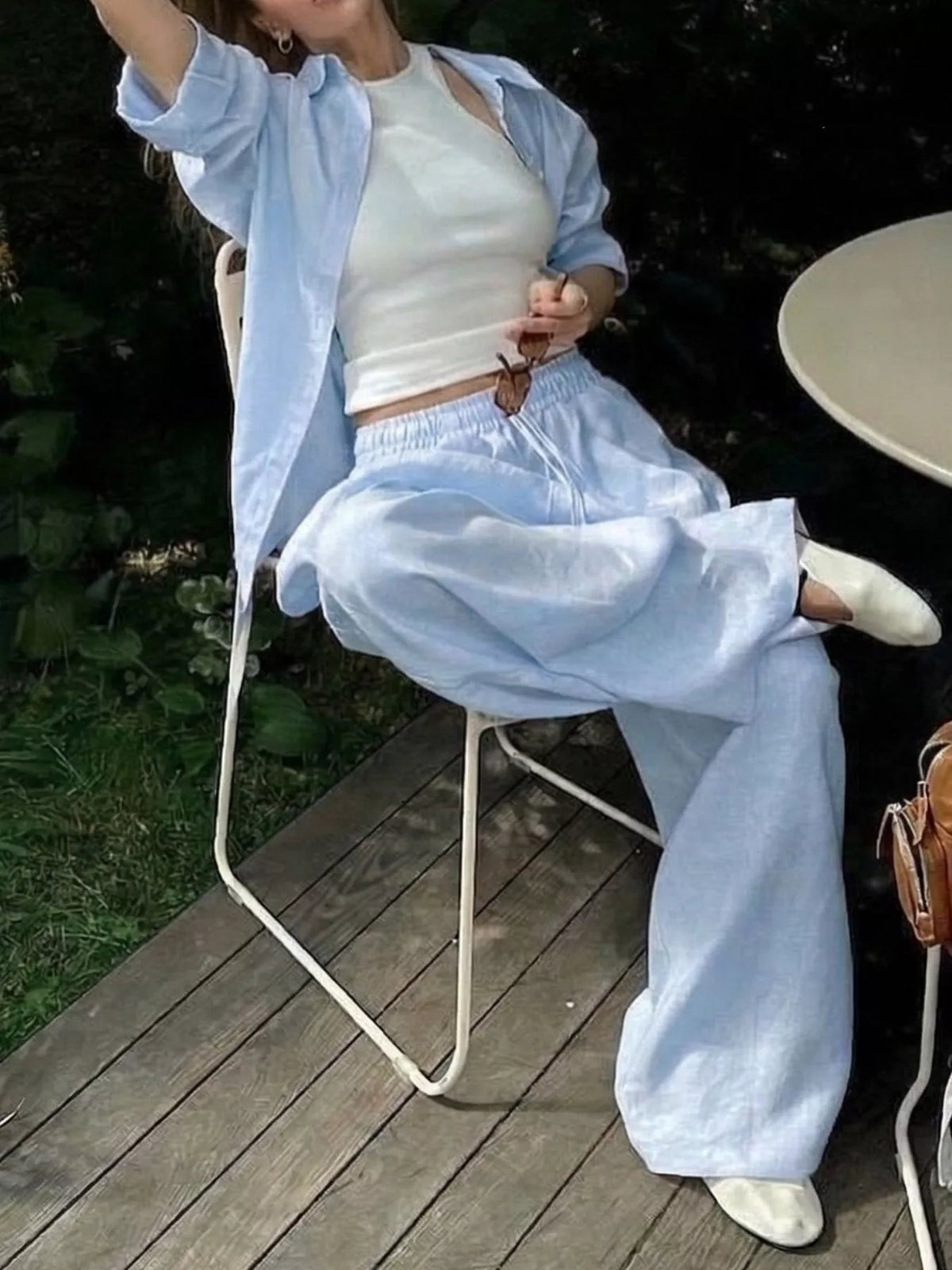 Plush Fashion Hub loungewear set with button-up shirt and drawstring pants, comfortable and casual for relaxed wear.
