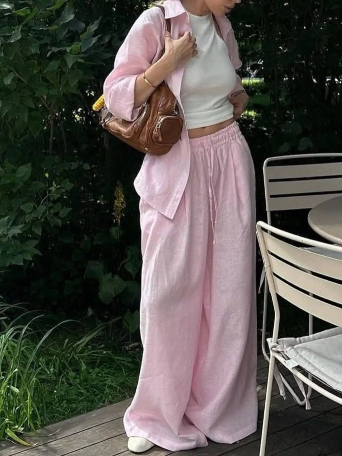Plush Fashion Hub loungewear set featuring a button-up shirt and drawstring pants, comfortable and stylish for relaxing at home.