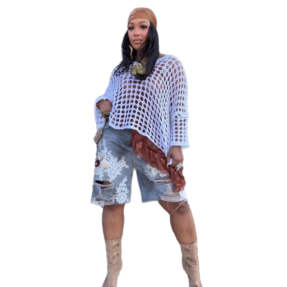 Ripped distressed denim shorts with lace hollow-out and 3D floral design by Plush Fashion Hub, featuring frayed edges and decorative floral accents.