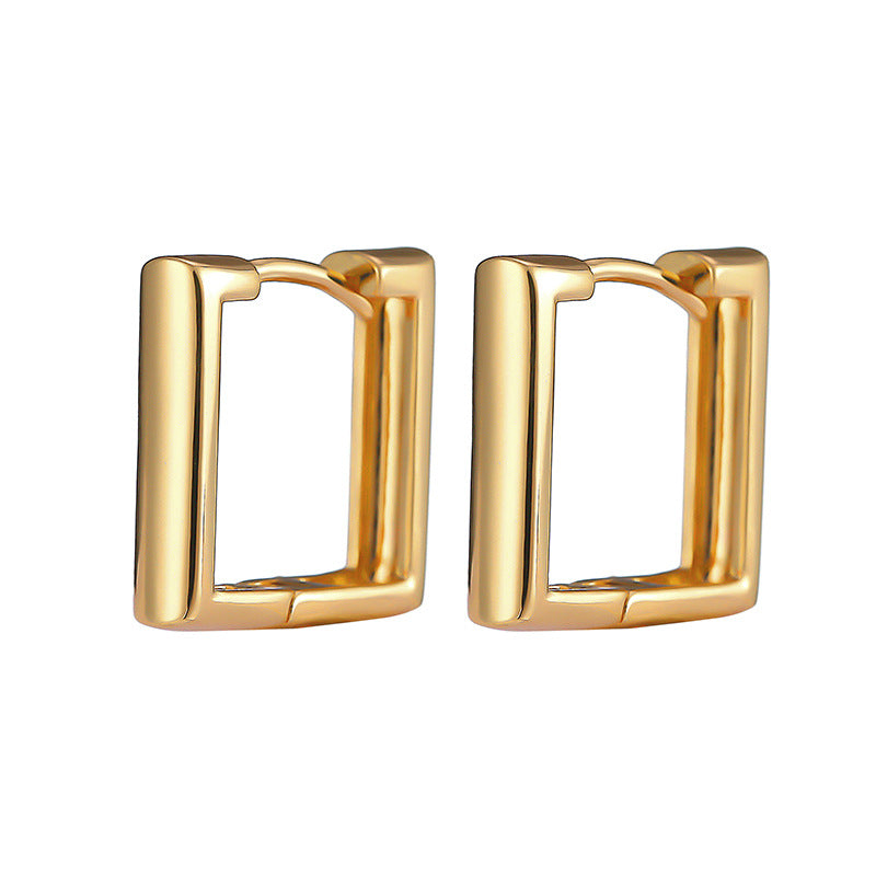 Gold-tone metal huggie hoop earrings with a geometric square shape and smooth, polished finish.