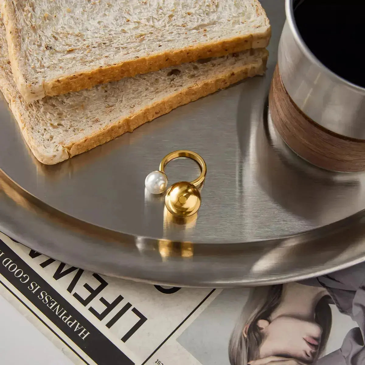 18K gold-plated celestial pearl and orb open ring with adjustable fit, featuring a stylish and elegant design.