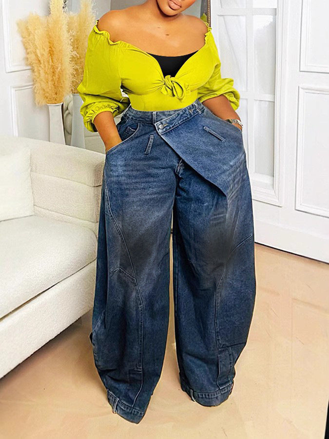 Women's retro distressed washed reversed waist jeans by Plush Fashion Hub, featuring a vintage-inspired, faded denim look.