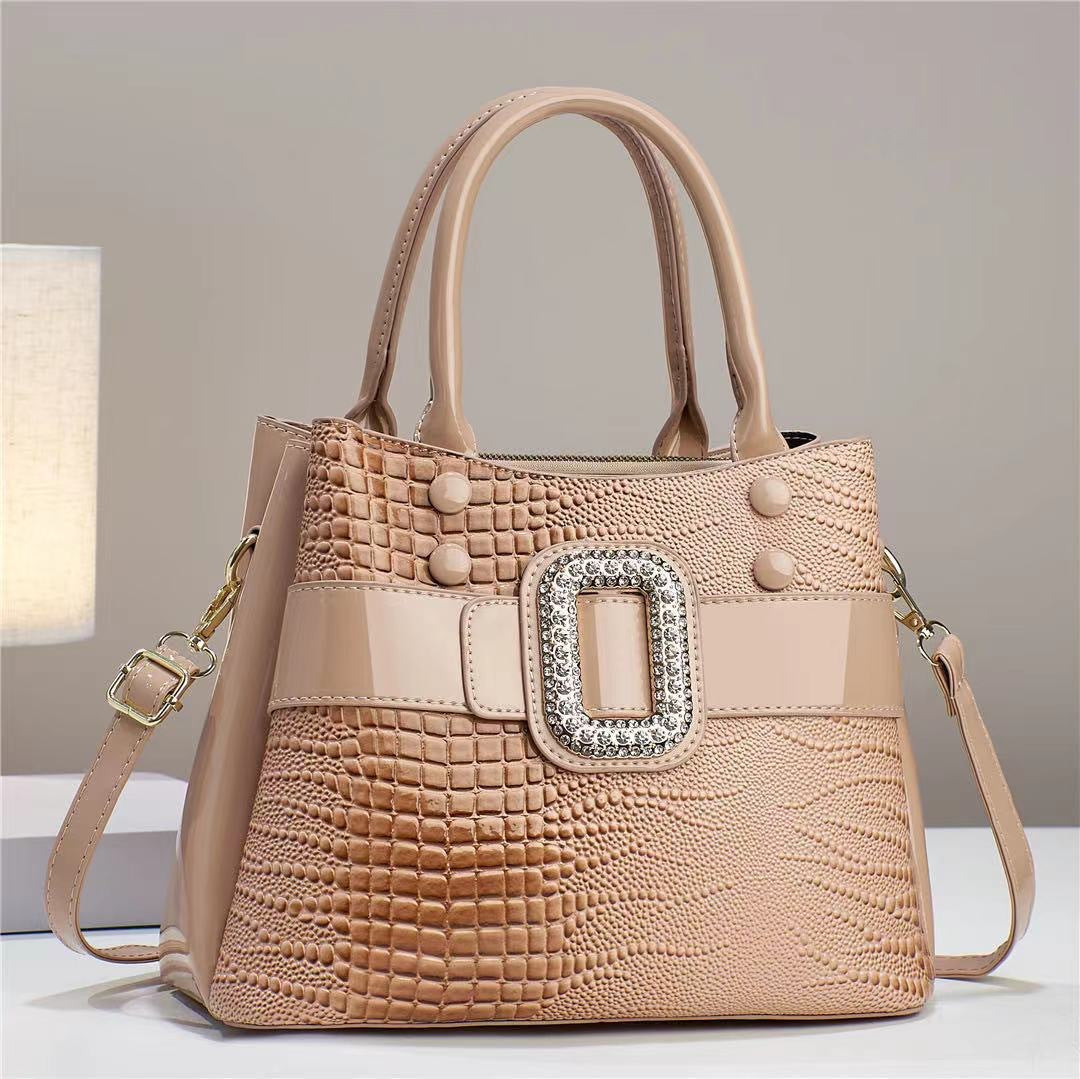 Lizard pattern mini bucket crossbody bag with zipper from Plush Fashion Hub, featuring a stylish and compact design.