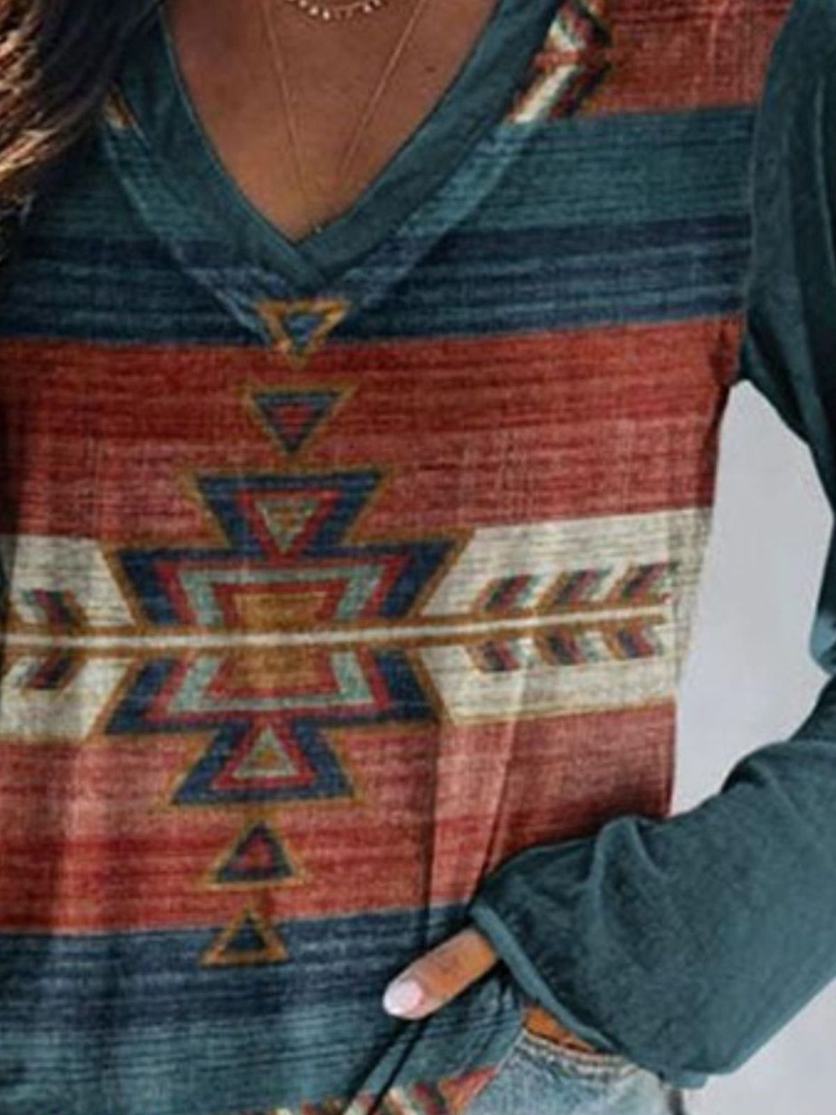 Plus size V-neck long sleeve T-shirt with geometric print by Plush Fashion Hub, casual top, natural fit and comfortable wear.