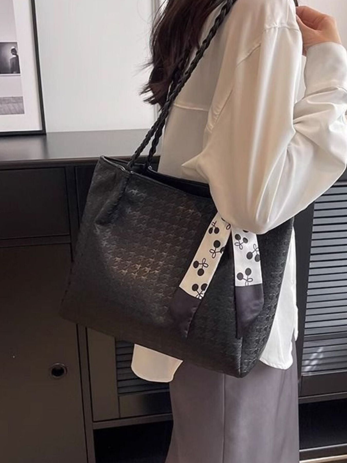 Plush Fashion Hub braided handle tote bag with woven strap, spacious design, and neutral fabric for everyday use.