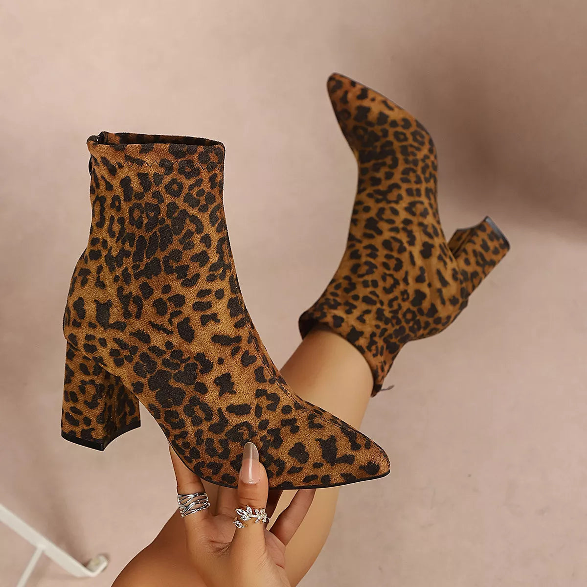 Women’s point toe block heel ankle boots by Trendsi, stylish ankle boots with a pointed toe and sturdy block heel.