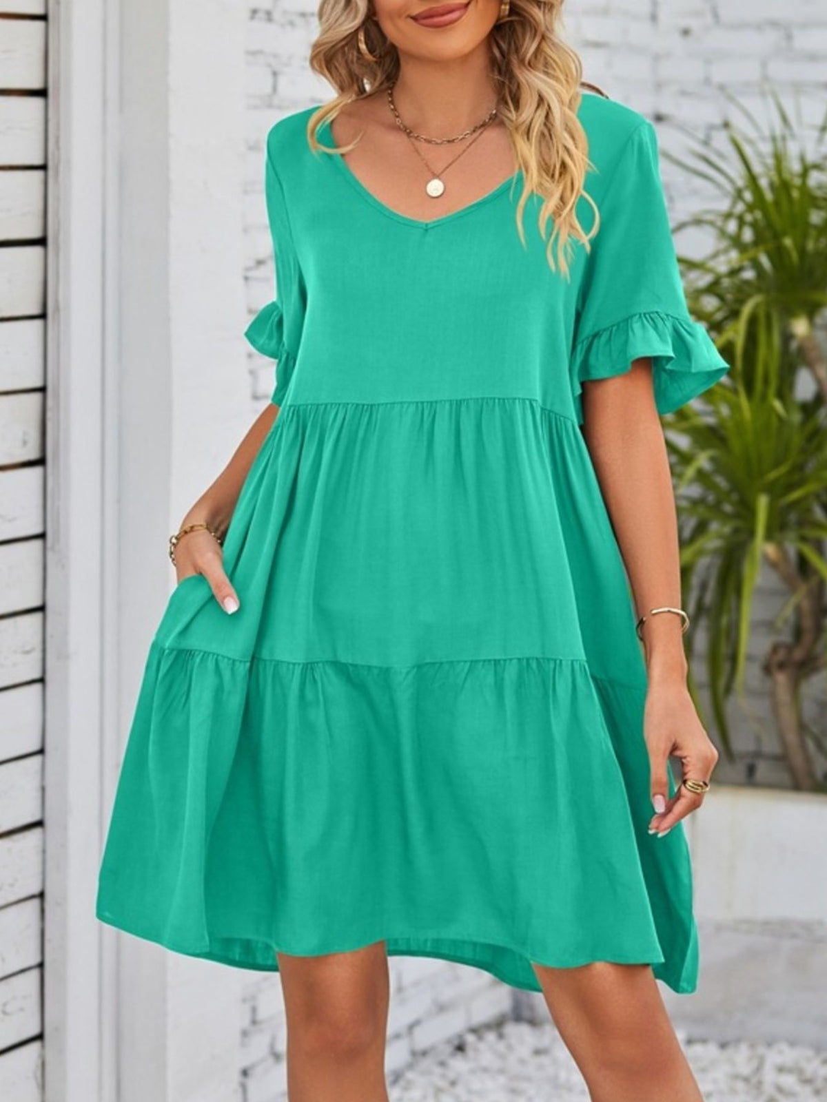 Lightweight rayon ruffled sleeve tiered mini dress with pockets from Plush Fashion Hub, featuring a flowy design and casual style.