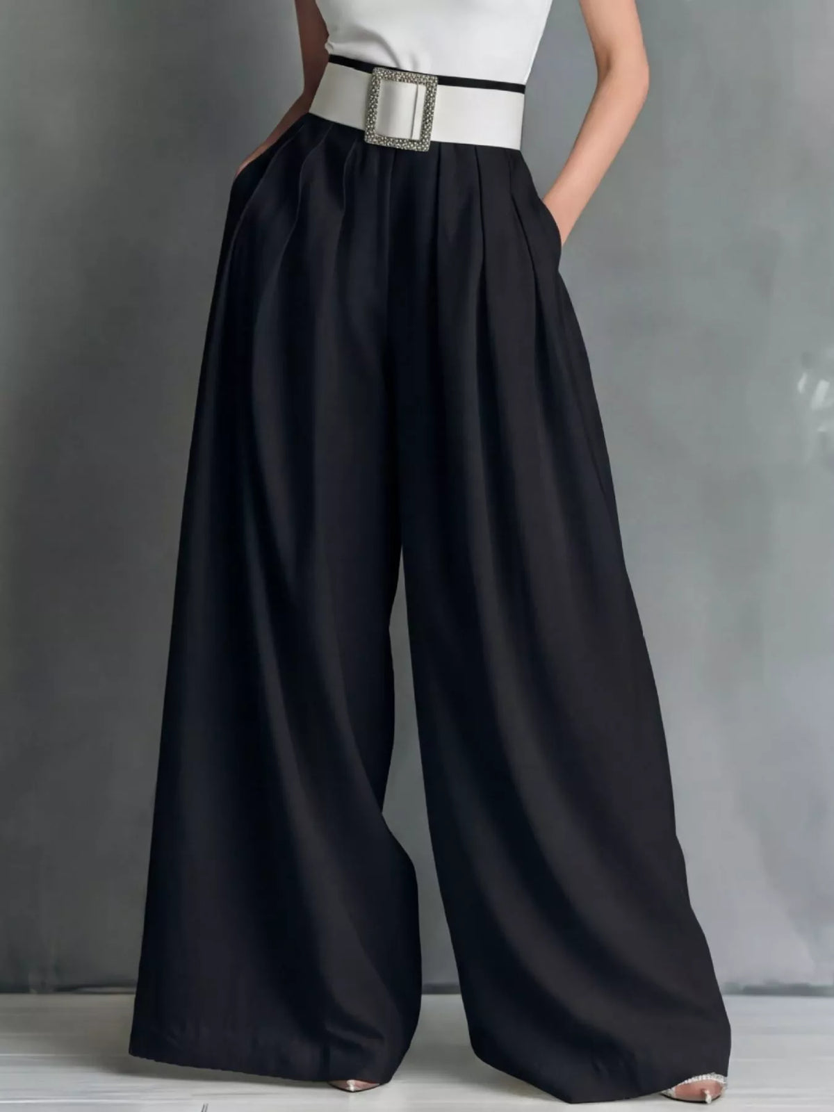 High-waisted wide-leg pants by Plush Fashion Hub, featuring a relaxed fit and stylish design, shown in the product image.