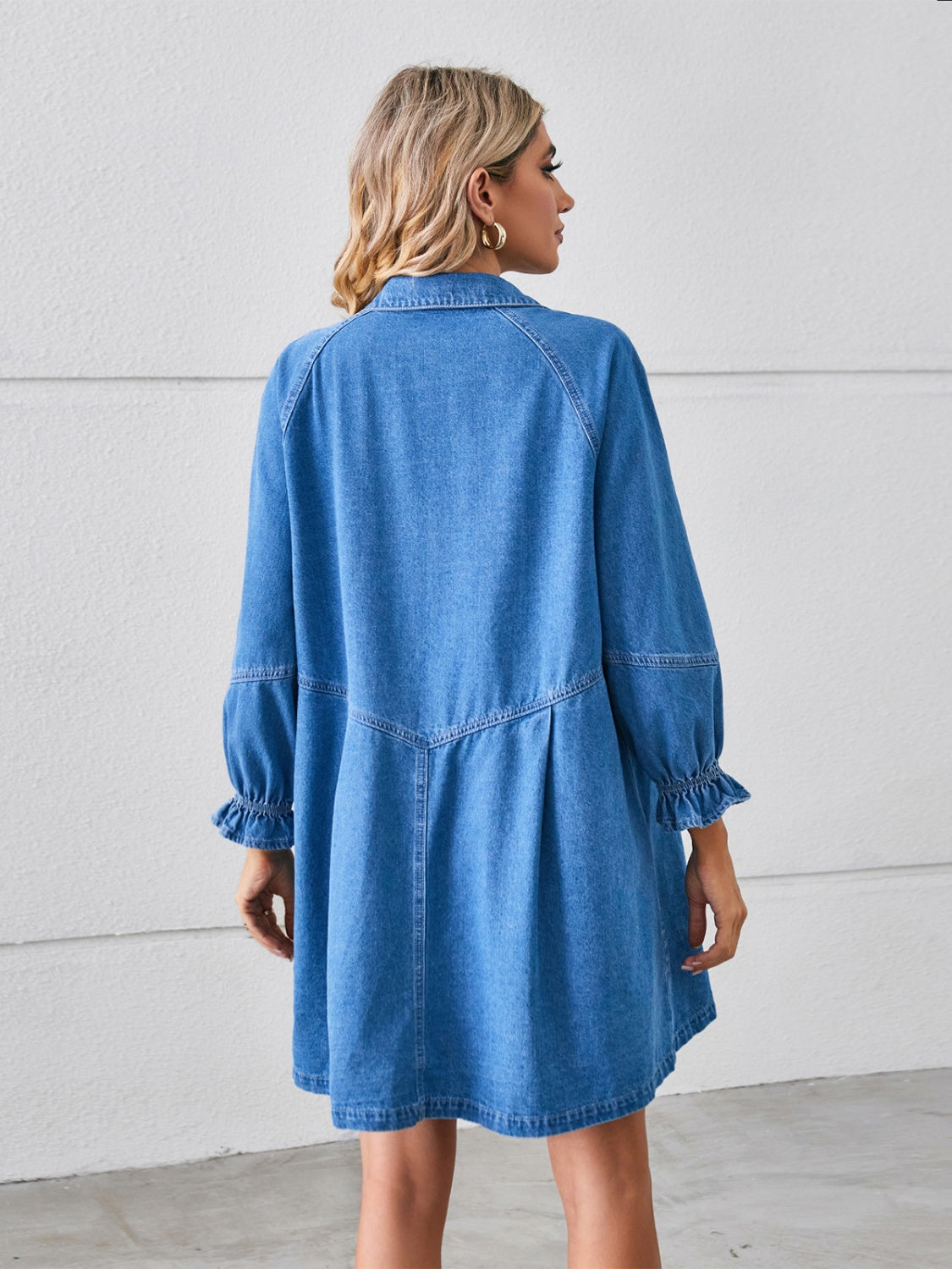 Button-up mini denim dress with flounce sleeves from Plush Fashion Hub, featuring a classic collar and stylish design.