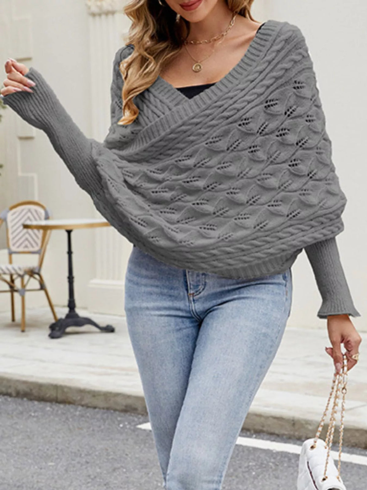Cable knit batwing sleeve sweater from Plush Fashion Hub featuring a cozy, textured knit design and relaxed fit.