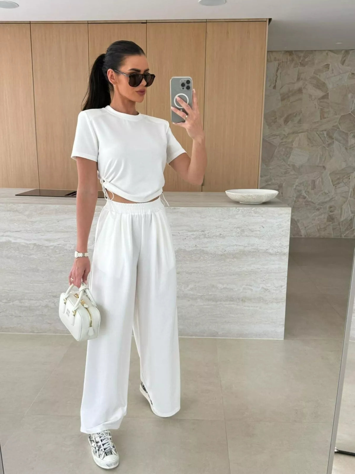 Drawstring crop top and wide-leg pants set by Plush Fashion Hub, featuring a stylish matching two-piece outfit.
