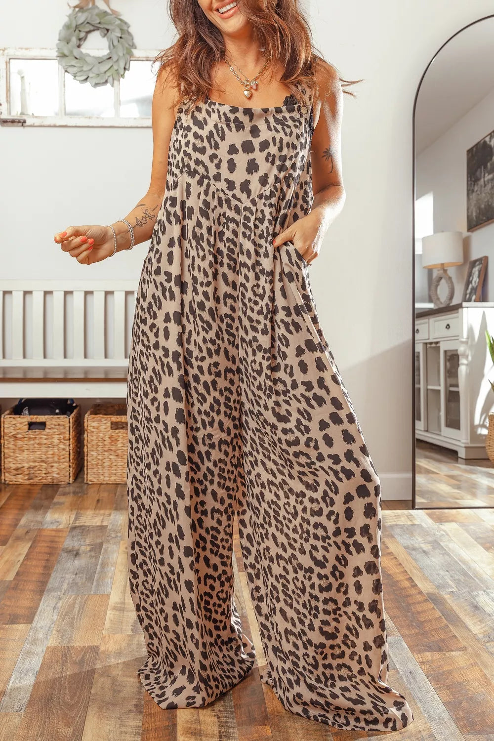 Leopard print square neck pleated wide-leg jumpsuit from Plush Fashion Hub, featuring a stylish square neckline and flowing wide-leg design.