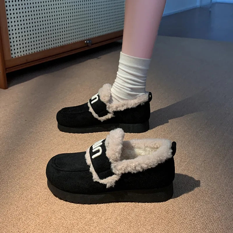Faux fur suede round toe slip-on footwear by Trendsi, featuring plush fur lining and casual slip-on design.