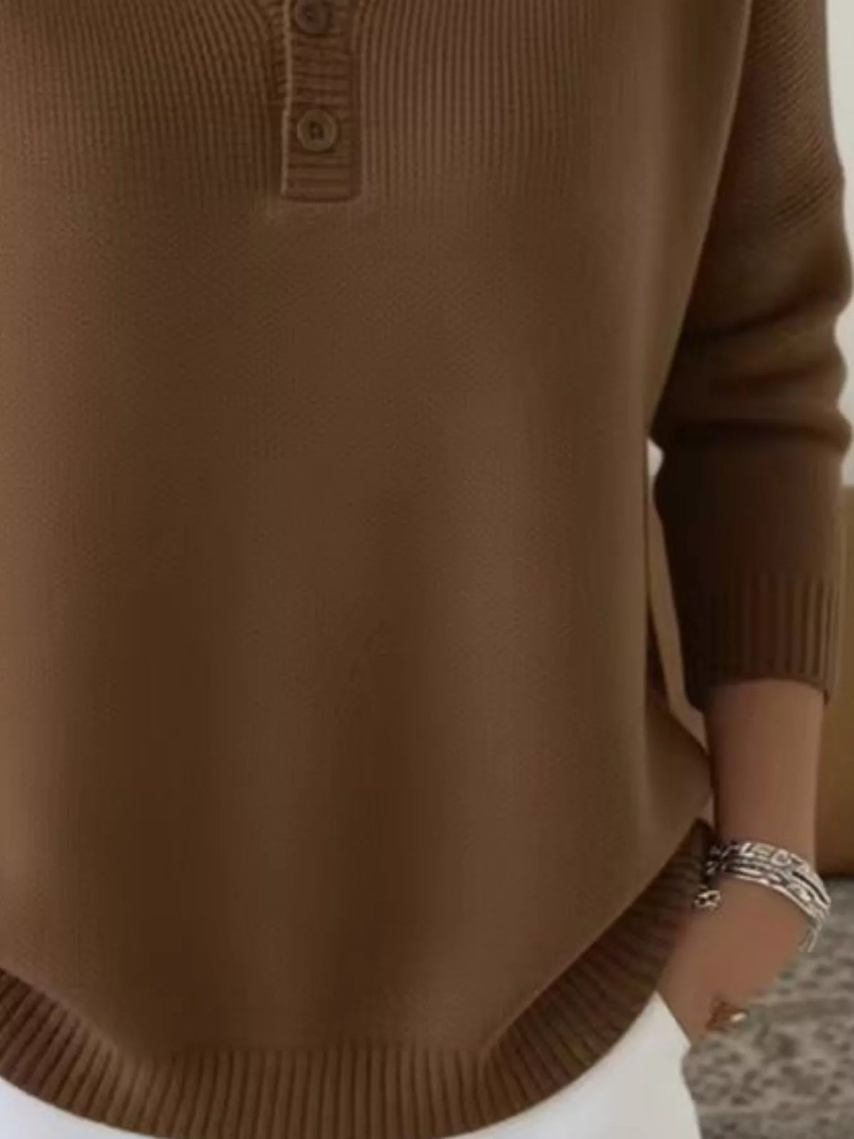 Plus size ribbed knit sweater with button details, featuring a cozy, full-length design from Trendsi.