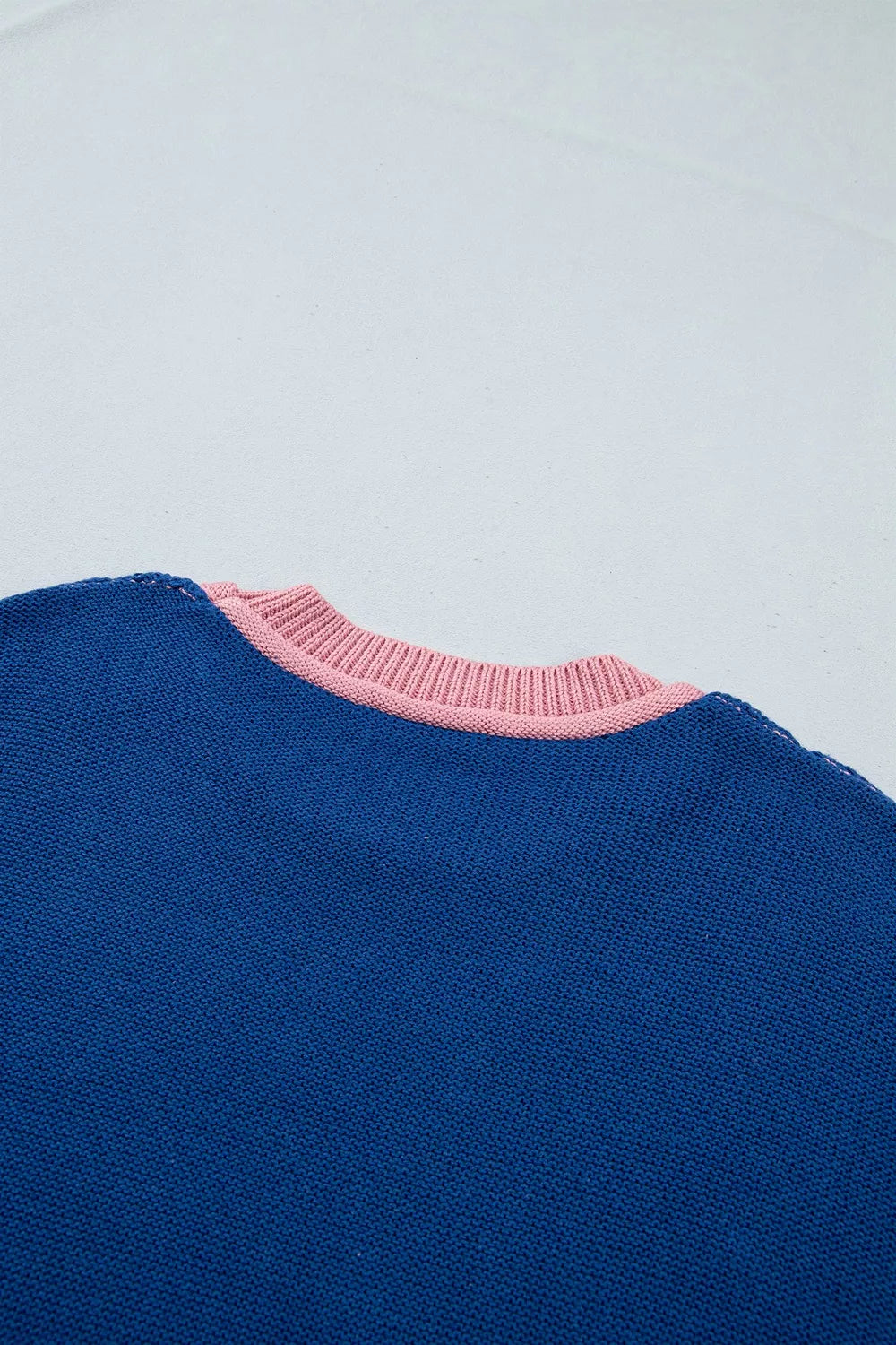 Colorful Western colorblock patchwork striped long sleeve sweater by Trendsi, featuring vibrant multicolor design and cozy knit fabric.