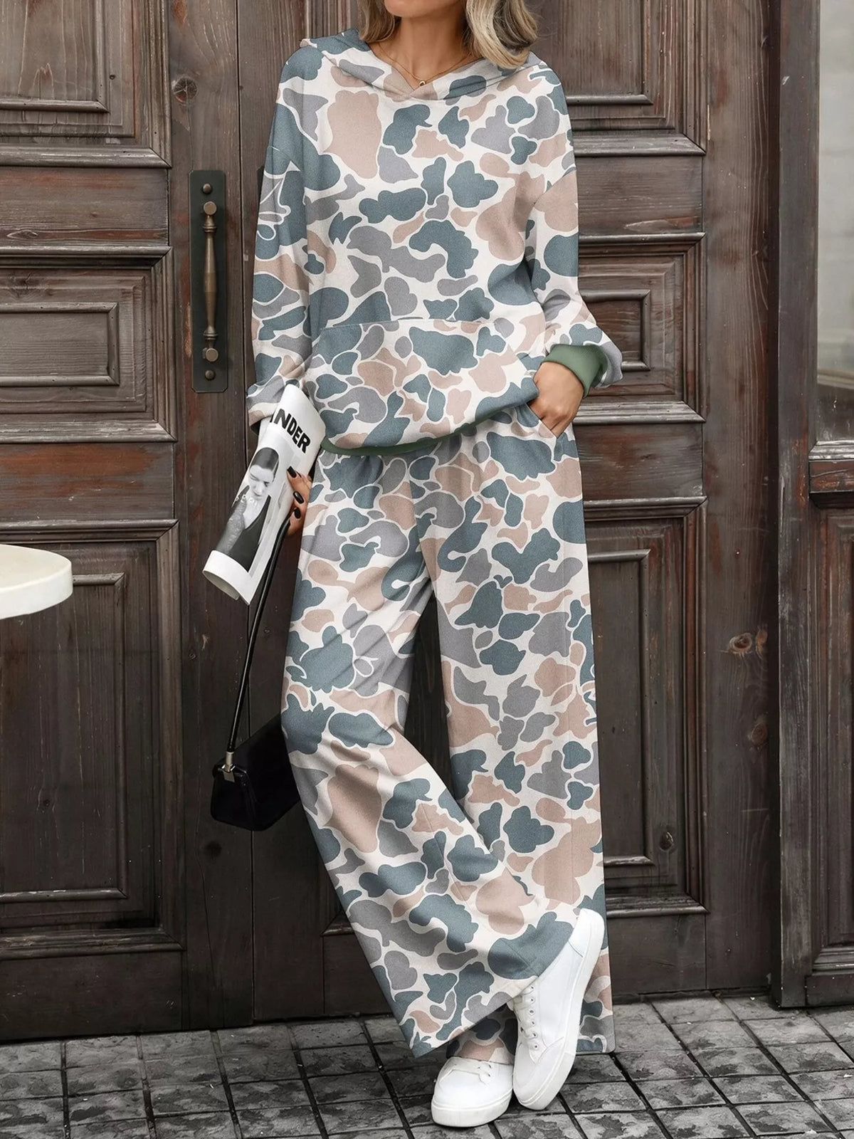 Printed long sleeve hoodie and pants set by Trendsi, featuring a comfortable matching loungewear outfit with vibrant patterns.