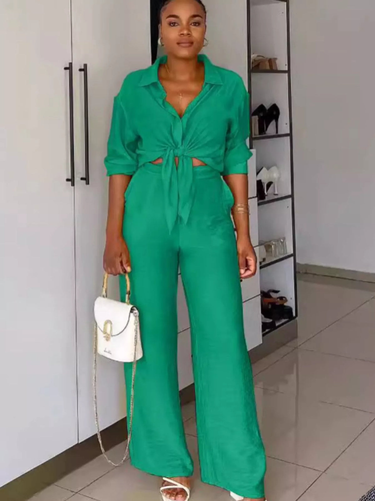 Plush Fashion Hub two-piece set with a tie-front top and wide-leg pants, featuring soft fabric and stylish design.
