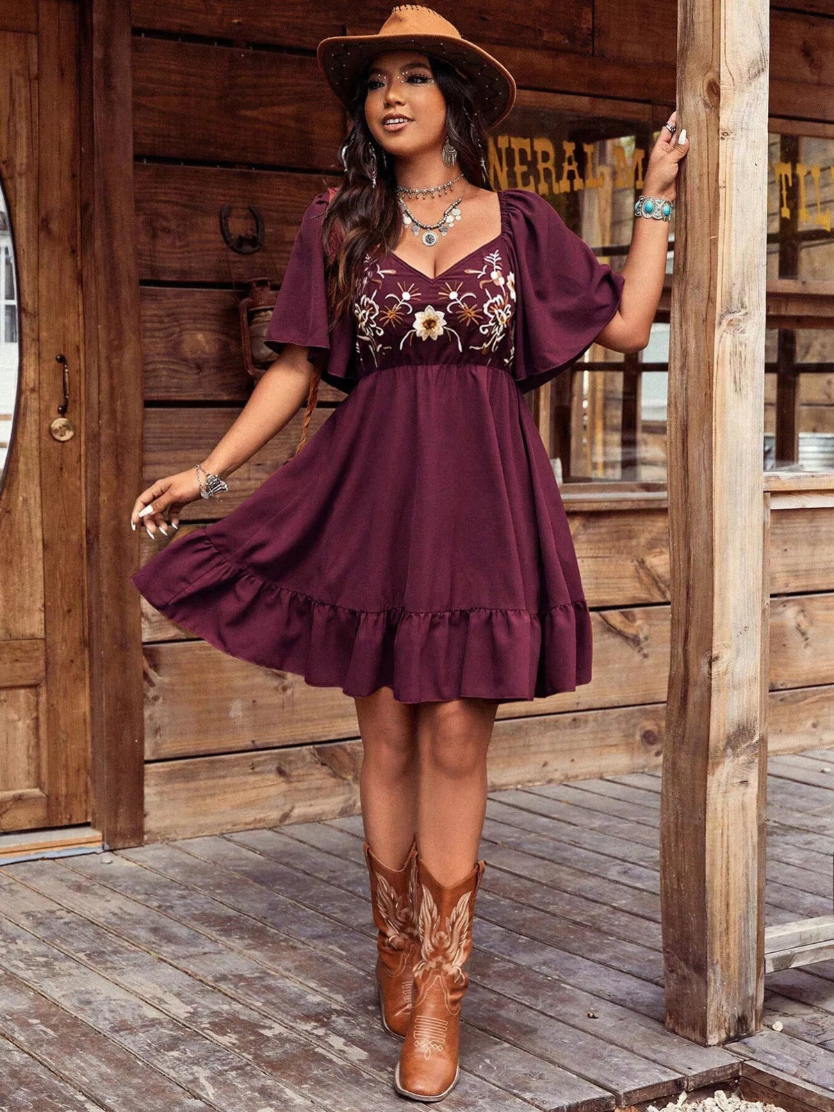 Embroidered Flutter Sleeve Mini Dress by Plush Fashion Hub featuring delicate embroidery and flowing flutter sleeves.