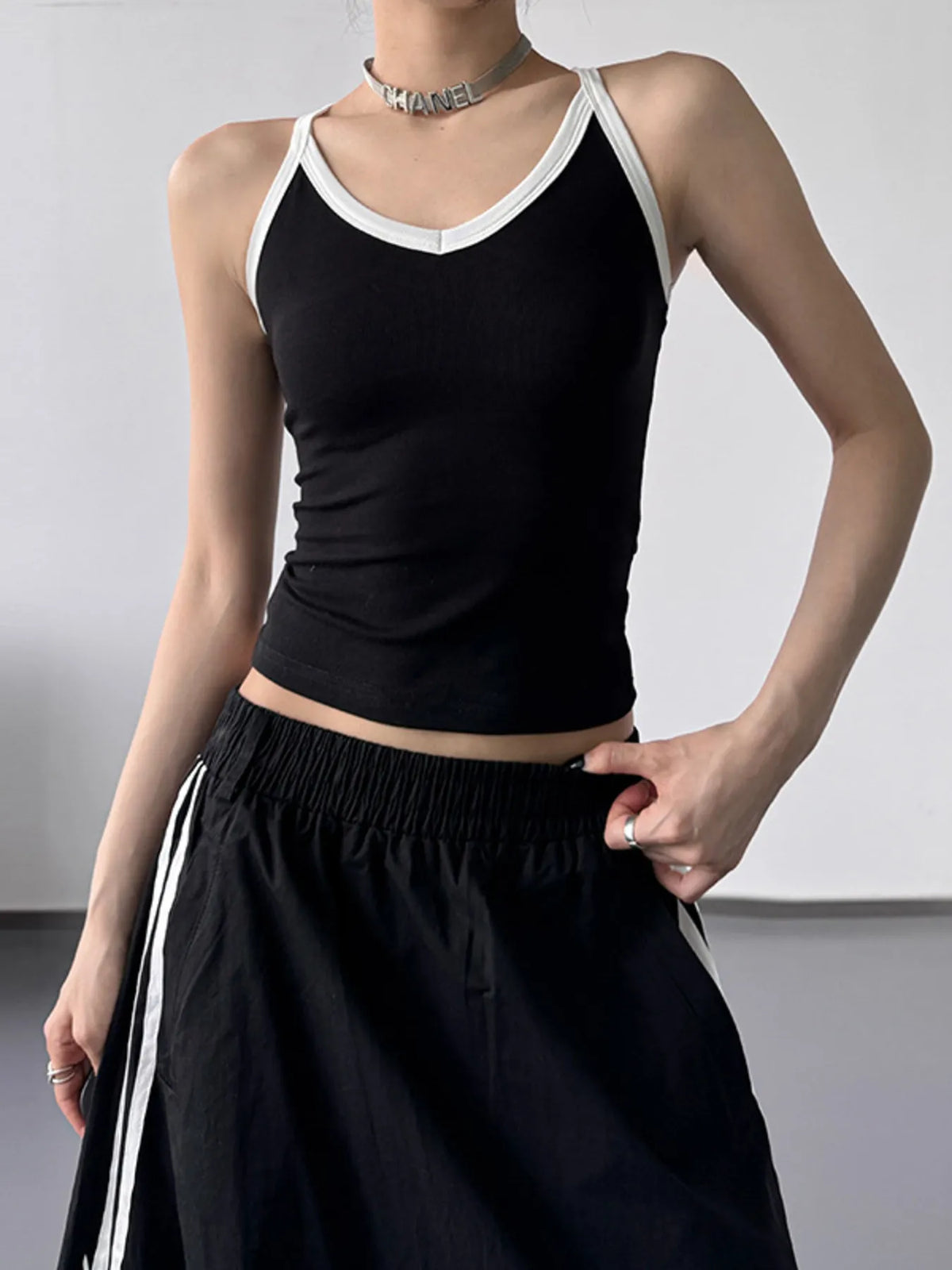 Contrast trim cami top from Plush Fashion Hub, featuring a stylish sleeveless design with contrasting neckline details.