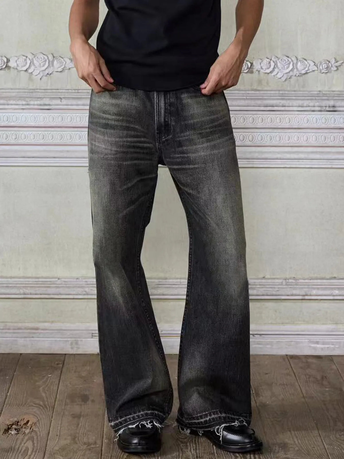 Men's vintage washed frayed hem denim jeans by Plush Fashion Hub, showing distressed details and classic denim texture.