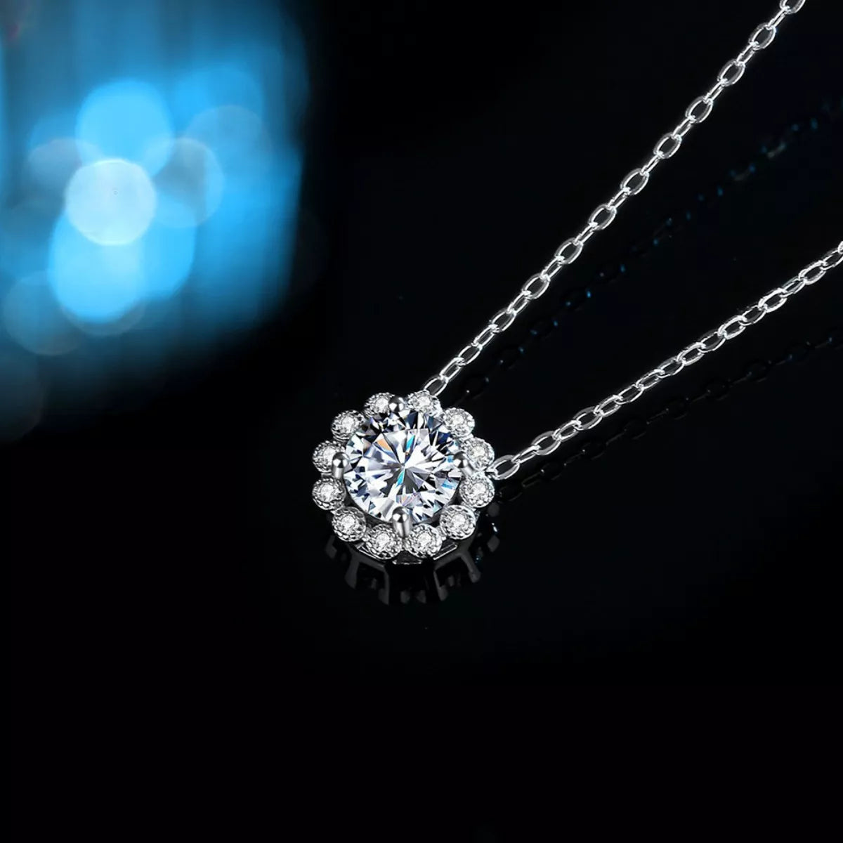 Sterling silver flower necklace with 1 carat moissanite gemstone, showcasing elegant jewelry design and sparkling details.