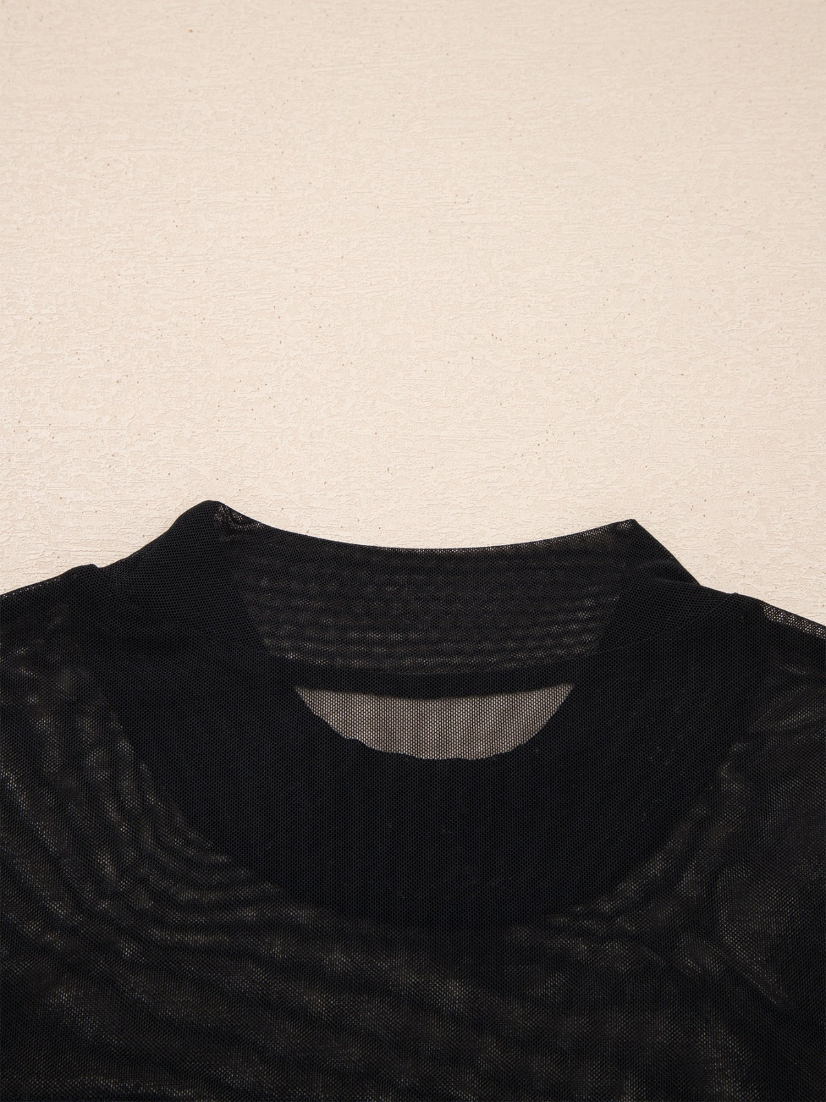 Women's sheer mesh patchwork cap sleeve layering top by Plush Fashion Hub, featuring elegant design and lightweight fabric.