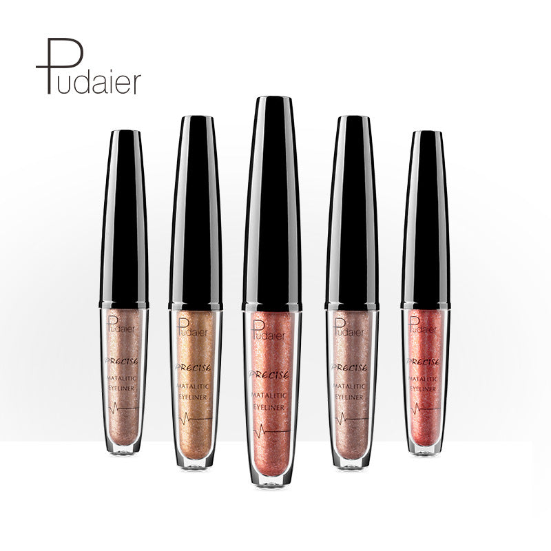 Five Pudaier metallic glitter eyeliners in plastic tubes with black caps, ranging from bronze to rose gold shades.