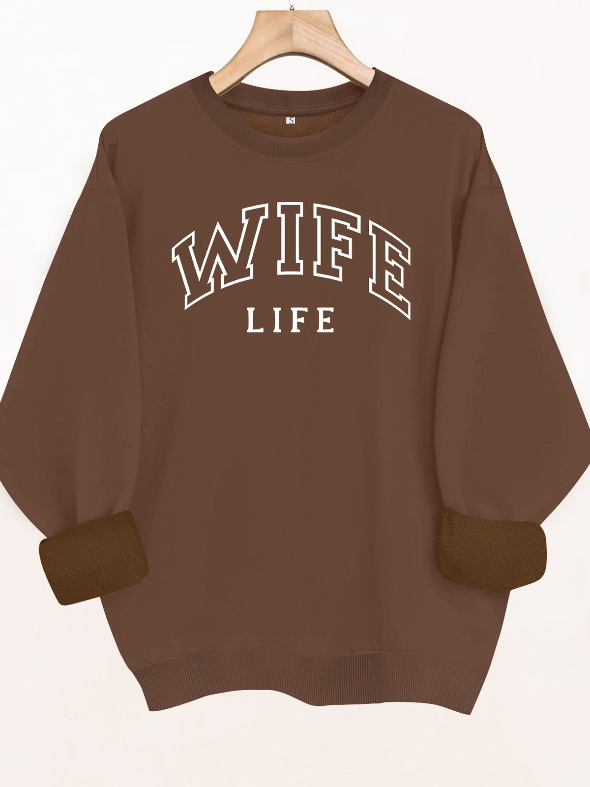 Brown fleece-lined sweatshirt with cuffed sleeves and white "WIFE LIFE" varsity text on chest.