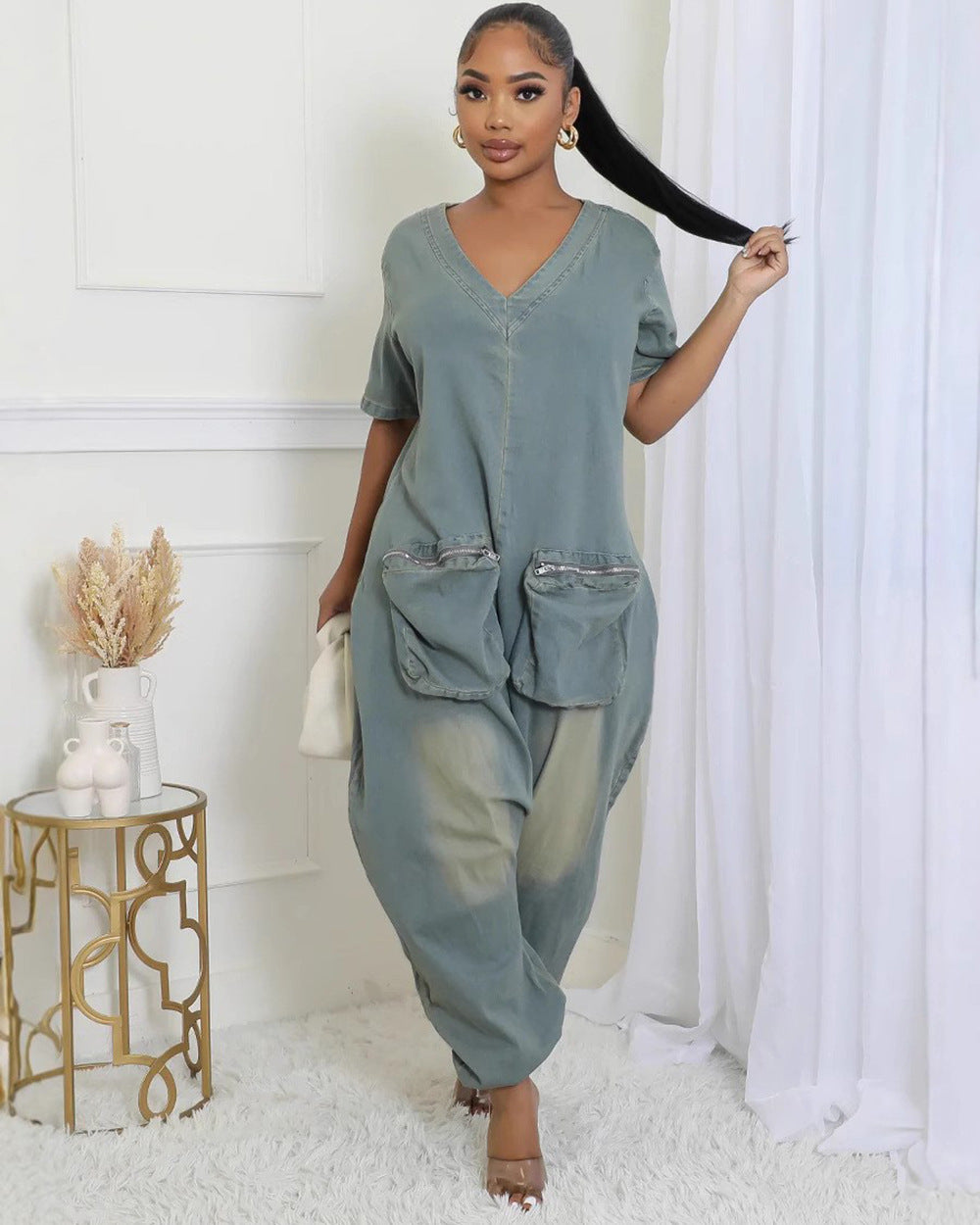 Women’s peacock blue washed denim overalls by Plush Fashion Hub with loose fit and front pockets, casual and stylish.