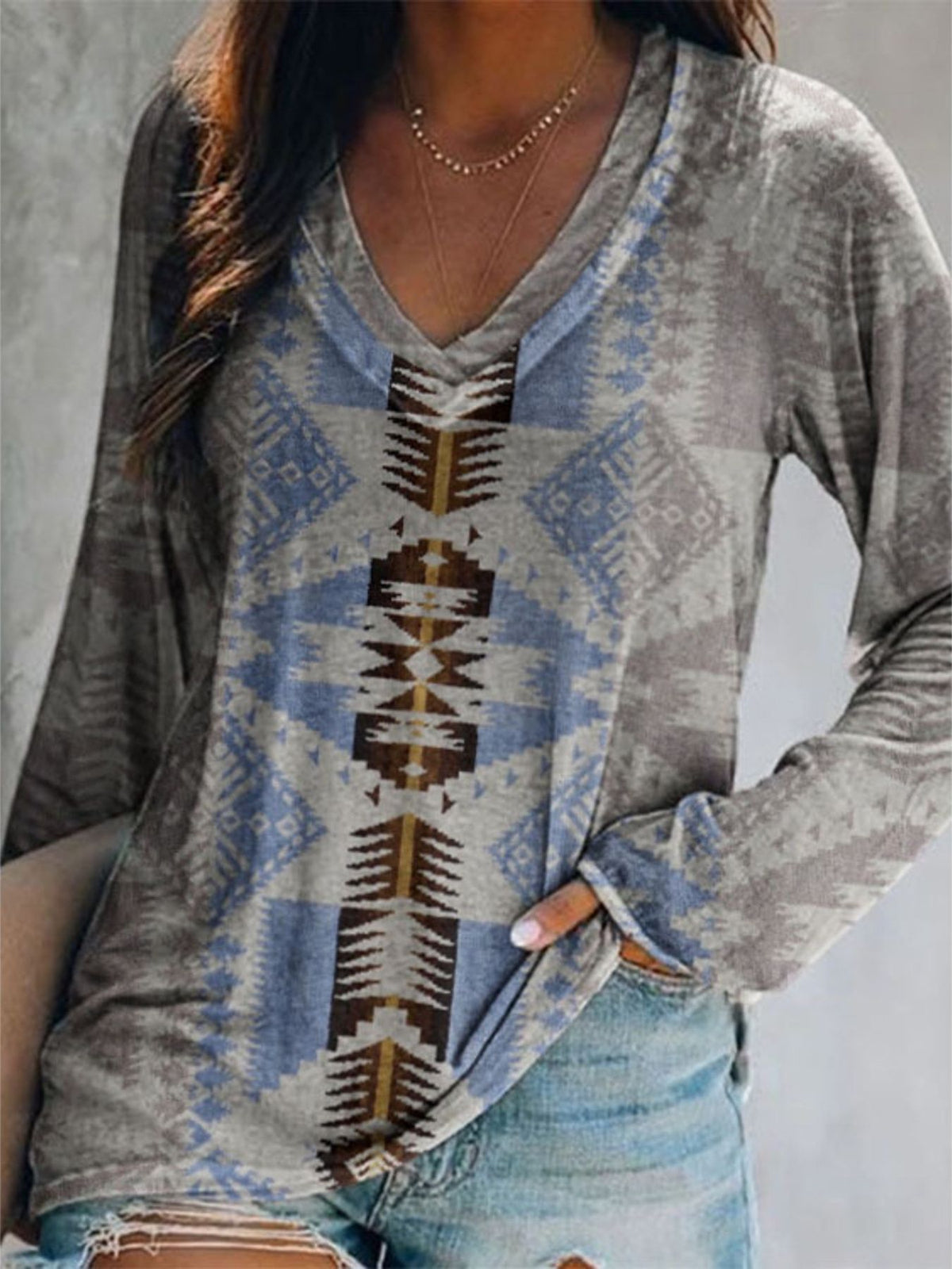 Plus size V-neck long sleeve T-shirt with geometric print from Plush Fashion Hub, casual top designed for comfort and style.