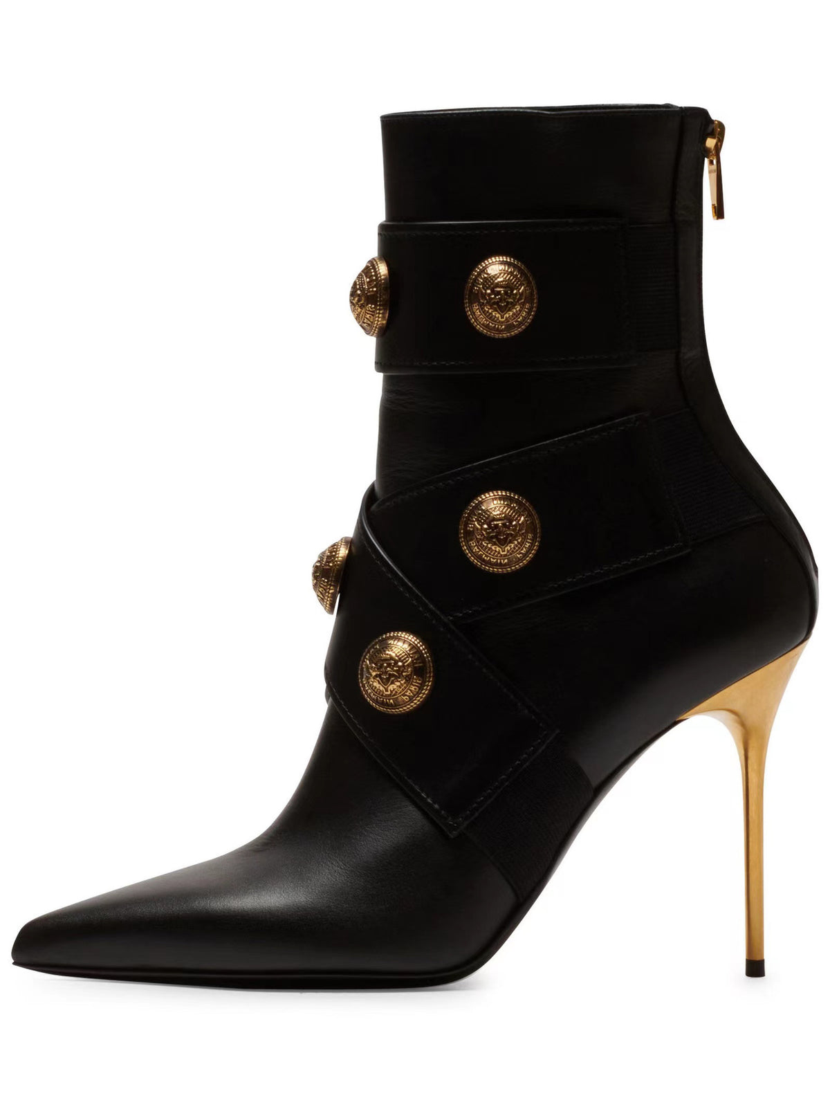 Black leather stiletto bootie, pointed toe, gold stiletto heel, buckled straps with ornate gold buttons.