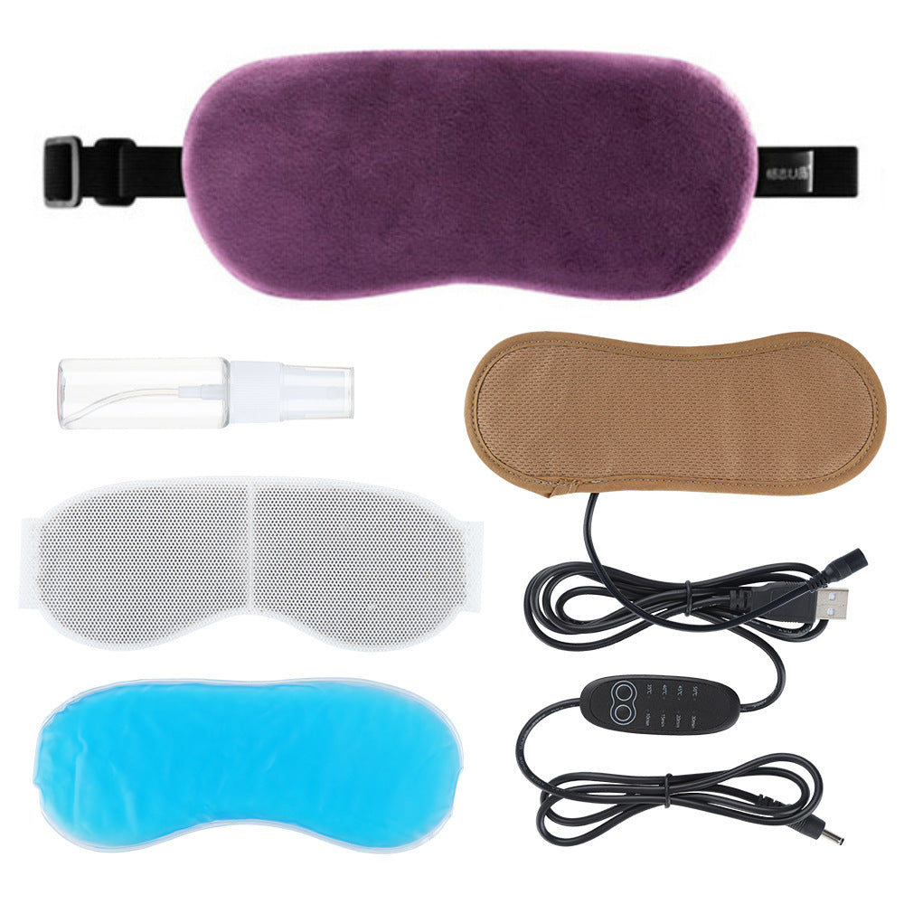 Purple plush eye mask with accessories including a brown mesh liner, blue gel pack, white mesh cover, spray bottle, and USB cord.