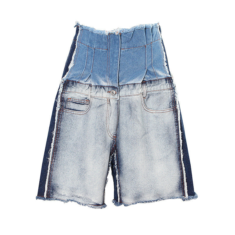 High-waist distressed patchwork denim jeans from Plush Fashion Hub showing frayed edges and patchwork design on a model.
