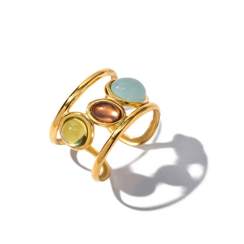 18K gold plated gemstone open cuff ring with a sleek design, featuring colorful gemstones on a stylish ring band.